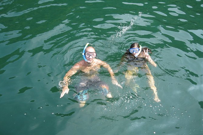 1 Day Boat Tour: HaLong Bay, Lan Ha Bay, Natural Beach and Full Moon Party - Starting from Cat Ba at 8:00 a.m.