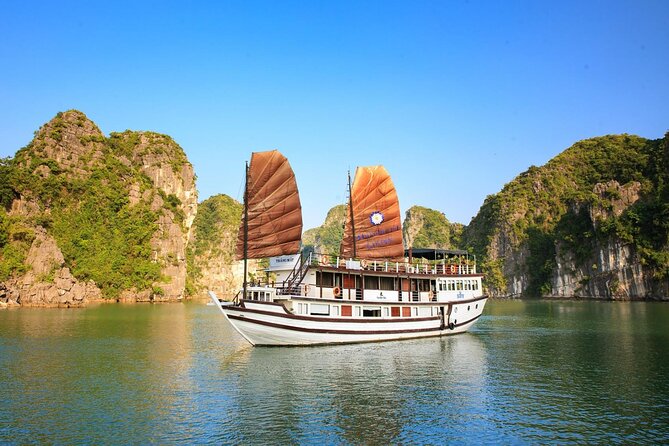 2-Day Boutique Cruise Discover Hidden Gems of Bai Tu Long Bay - Afternoon kayaking and beach time at Cap La