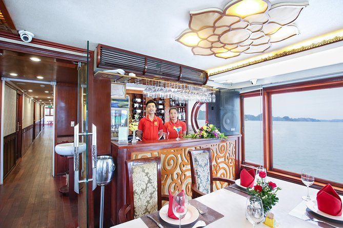 2-Day Oriental Sails Junk Cruise of Halong Bay - Sunset, cooking, and dinner on board