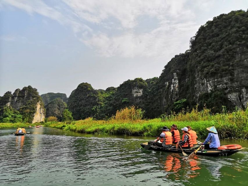 2-Day Trang An, Bai Dinh, Mua Cave, Ha Long Bay Cruise - Rowing through Trang An’s cave country