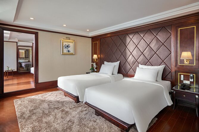 2 Days Gem Cruise Guided Tour in Halong Bay - Sunset, dinner, and squid fishing