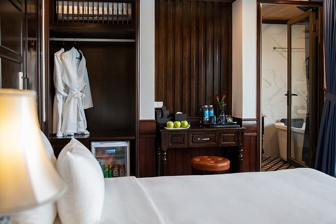 All-Inclusive 2 Day/1 Night Halong Luxury Cruise, Meals, Cave, Kayaking,Swimming - Day one: Bai Tu Long, Halong Bay, and the first views