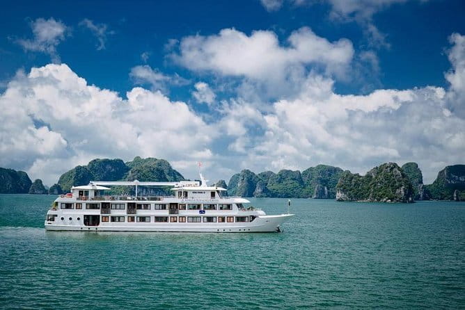 Athena Luxury Cruise in Halong Bay with Meals,Balcony Room & Cave - Boarding, lunch, and the first view of the bay