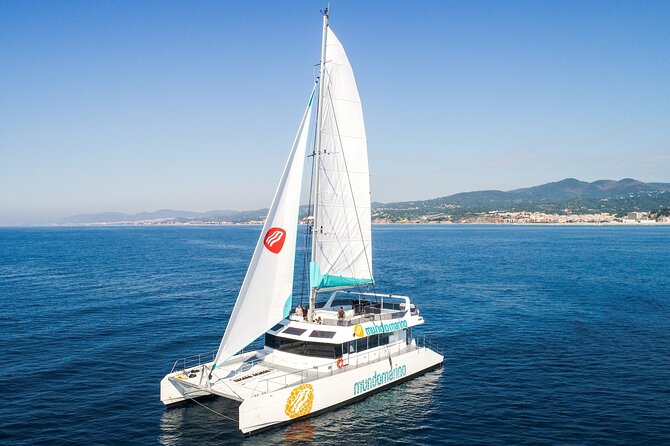 Bay of Malaga Catamaran Sailing - Leaving the harbor and passing the modern port