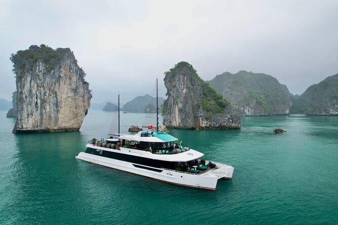 Best Selling Catamaran Cruise Premium Day Trip Explore Halong Bay - A full day between Hanoi and the limestone islands