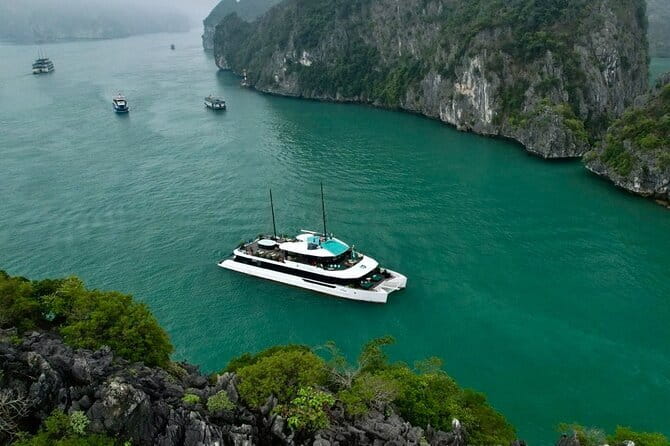 Best Selling Catamaran Cruise Premium Day Trip Explore Halong Bay - Boarding the catamaran before lunch