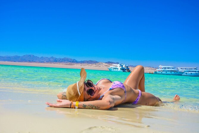 Boat Trip Orange Bay Island with 2 Snorkeling Stops in Hurghada - Lunch, drinks, and time back on the boat