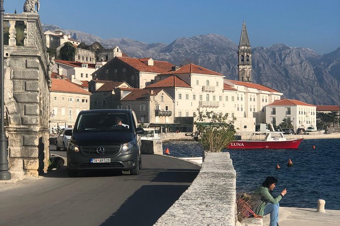 Boka Bay tour by car or speedboat (Private tour) - Kotor: medieval walls below Mount Lovćen