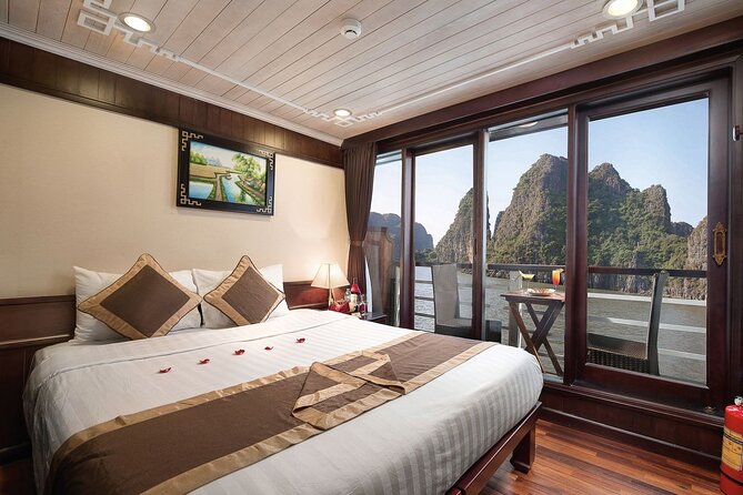BOUTIQUE CRUISES Halong Bay 2 Days,1 Night Tour: Swimming,Caving, and Kayaking - Hanoi pickup and the expressway to the bay