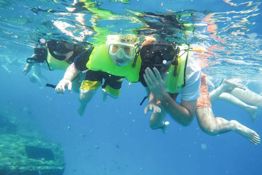 Bridgetown: Carlisle Bay Turtle and Shipwreck Boat Cruise - The slide and top-deck jump