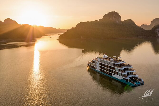 Capella Cruise Halong Bay 2Day/1 Night 6 Star Cruise All Included - Day two: Tai Chi, buffet breakfast, and Thien Canh Son Cave