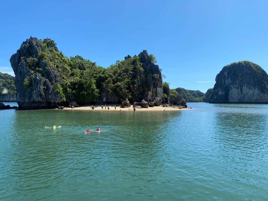 Cat Ba : Lan Ha Bay Bioluminescent Plankton Kayak Boat Tour - Cruising past the Floating Fisherman Village
