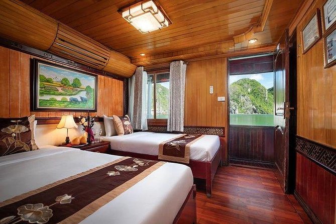 Cozy Bay Cruise: 2-Day Explore Halong Bay With Transfer From Hanoi - Ti Top Island: swim or climb for the view