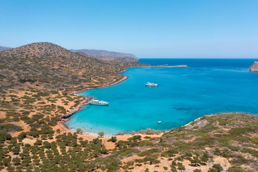 Crete: Mirabello Bay Cruise with Onboard Cocktail - Pickup, cancellation, and accessibility