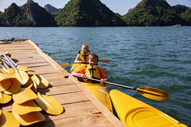 Discover Ha Long Bay in 2 Days and 1 Night Cruise Experience - Day two: Tai Chi, caves, and the trip back