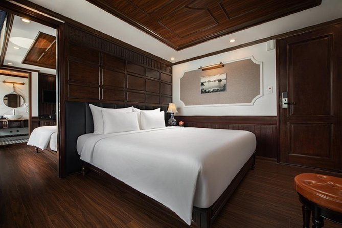 Doris Cruise 5 star cruise 3 days visiting Halong - Lan Ha Bay - Afternoon paddling and swimming near Three Peaches Beach
