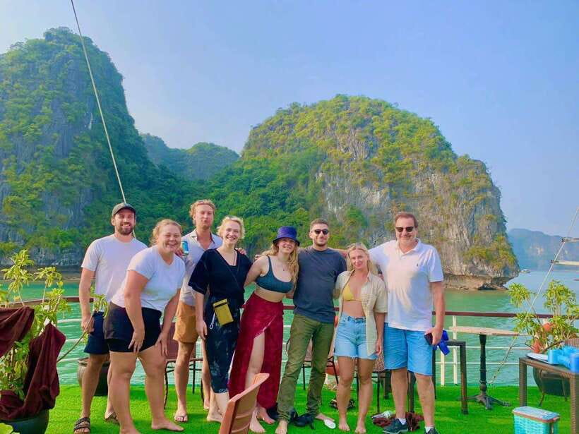 From Cat Ba : Lan Ha Bay Kayaking, Snorkling Full-Day Cruise - 8:30 AM: cruising past karsts and floating villages