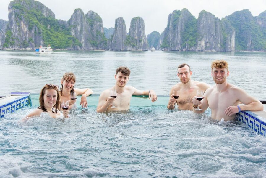 From Hanoi: 1-Day Halong 5-Star Cruise w/Jacuzzi & Limousine - Sunset party and the ride back