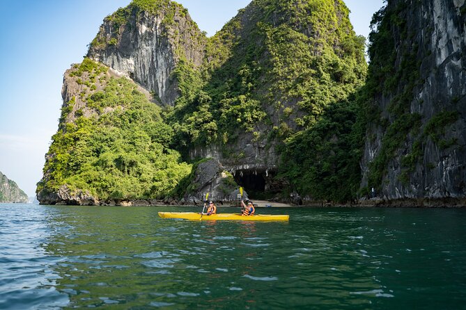 From Hanoi: 2D1N Ha Long Bay Deluxe Cruise with Bus Limousine - Sunset, dinner, and your evening onboard