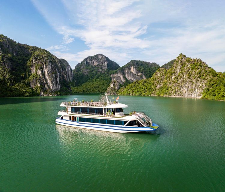 From Hanoi: Ha Long Bay 5-star Day Cruise with Buffet Lunch - Boarding the boat and settling in for lunch
