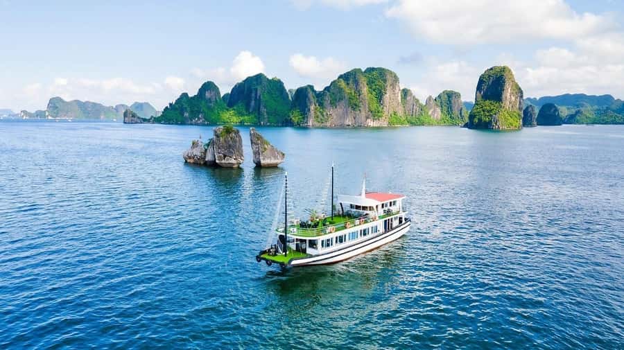 From Hanoi: Ha Long Bay Luxury Day Cruise with Food & Kayak - From Hanoi’s Old Quarter to Tuan Chau Marina