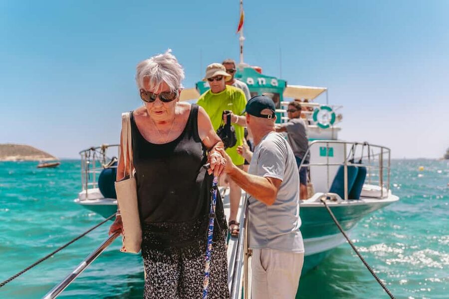 From Magaluf: Palma Bay Sightseeing Cruise with Live Music - A light Mediterranean lunch on board