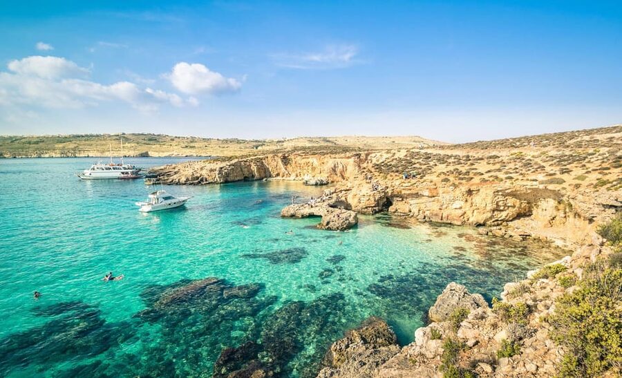 From Mellieha: Three Bay Cruise including the Blue Lagoon - The return route adds more than a straight ride home