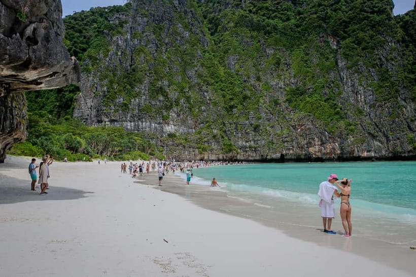 From Phi Phi : Maya Bay Longtail Boat Tour - Riding a classic longtail boat