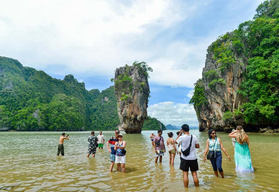 From Phuket: James Bond & Phang Nga Bay Tour by Longtail - Boarding the longtail boat at Surakul Pier