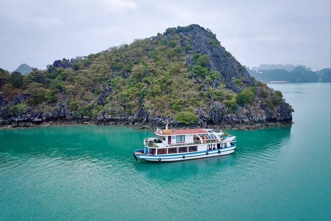Full day Boat Tour Lan Ha Bay - Ha Long Bay: Kayak, Beach Hopping - Dark and Light Cave is the active centerpiece