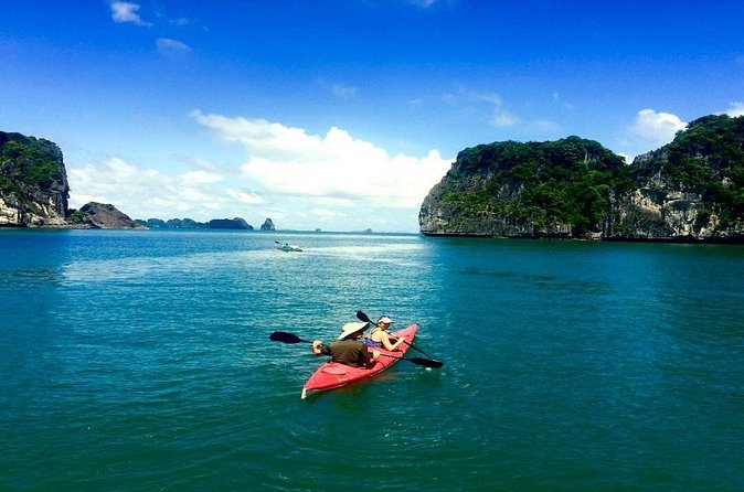 Full-Day Halong Bay Tour Including Kayaking from Hanoi - Vietnamese lunch with limestone islets outside