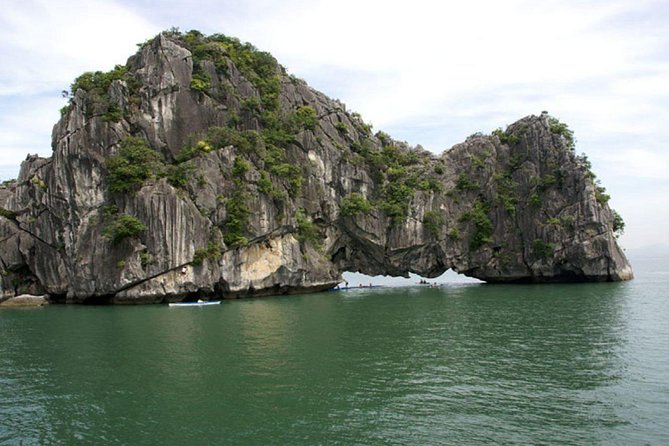 Full-Day Halong Bay Tour Including Kayaking from Hanoi - Boarding the junk boat around noon