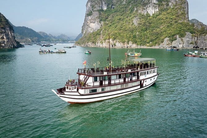Garden Bay Cruises - Traditional Wooden Boat to Bai Tu Long Bay - Day one: lunch, lagoons, and Cap La Island