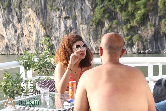 Ha Long Bay Cruise Day Tour with lunch, kayaking, surprise cave & titop island - Cruising among Ha Long Bay’s limestone peaks