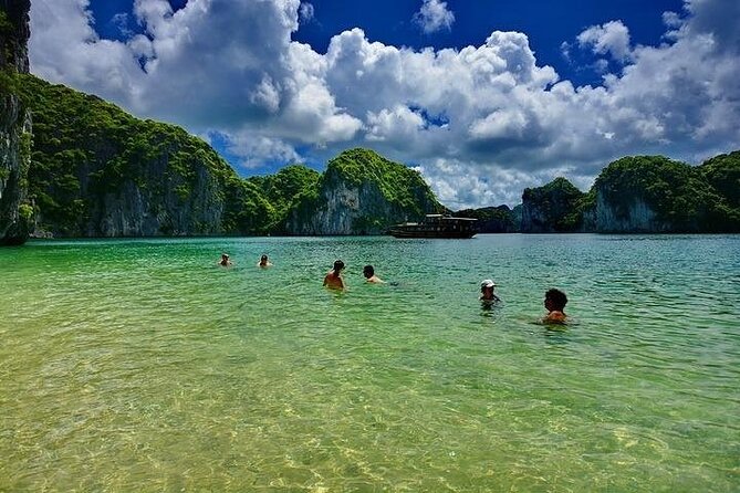 Ha Long Bay Day Cruise, Cave, Kayaking, Swimming, Bus & Lunch - Titov Island, swimming, and the climb