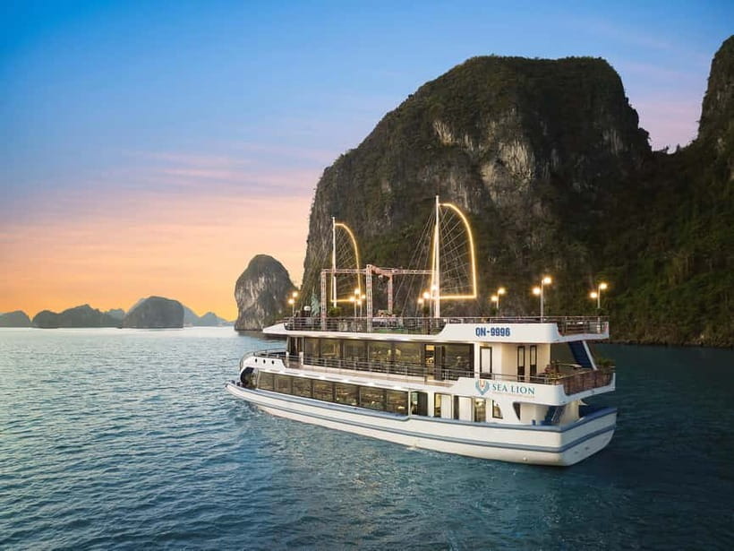 Ha Long Bay- Luxury Day Cruise, Lunch& Kayaking&Sunset party - Fighting Cock Islets and the first bay views