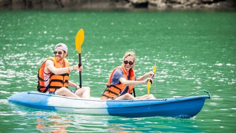 Ha Long: Half Day Cruise with Lunch, Kayaking, and Swimming - The return cruise and sunset snack