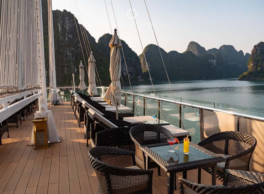 Ha Long–Lan Ha Luxury Yacht Day Cruise from Hanoi - Spring rolls, snacks, and sunset from the front deck
