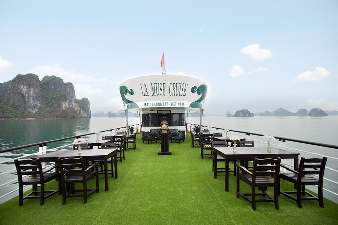 Half Day Explore Bai Tu Long Bay With Lunch, Cave and Kayaking - Lunch with views of Mat Quy and Teapot Islets