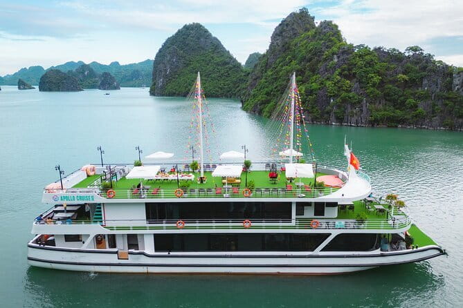 Halong Apollo 5<em> Cruise with Jacuzzi Day Trip And Buffet Lunch – Key points to know before booking’ /></p>
<ul>
<li><strong>Six-hour cruise in one day:</strong> You see several major Halong Bay sights without booking an overnight boat.</li>
<li><strong>Maximum group of 19:</strong> The small group size should make transfers and guide instructions easier to manage.</li>
<li><strong>Three active stops:</strong> You can kayak or take a bamboo boat at Luon Cave, walk through Sung Sot Cave, and swim or climb at Ti Top Island.</li>
<li><strong>Buffet lunch included:</strong> Asian and European dishes are served onboard, while drinks at lunch cost extra.</li>
<li><strong>Guide quality matters:</strong> Tommy is praised for fluent English, clear directions, humor, photo skills, and personal attention.</li>
<li><strong>Weather affects the trip:</strong> Poor weather can lead to a date change or a full refund.</li>
</ul>
<h2>Hanoi to Tuan Chau: the price of a day in the bay</h2>
<p><img width="669" height="446" decoding="async" src=