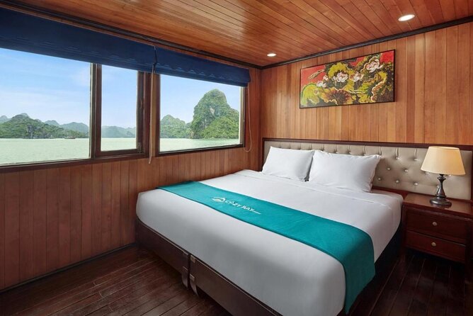 Halong Bay 2 Days 1 Night - Cozy Bay Cruise 3<em> – Key points to know before booking’ /></p>
<ul>
<li><strong>Sung Sot Cave is the major day-one sight:</strong> Allow about an hour for Halong Bay’s best-known cave stop.</li>
<li><strong>Titop or Soi Sim Island adds a choice:</strong> Climb for a wide bay view or spend time on the sandy beach.</li>
<li><strong>Kayaking takes place on the second morning:</strong> You get time to paddle independently around the bay.</li>
<li><strong>The $149 price includes the big essentials:</strong> Round-trip expressway transport, meals, admission fees, guide service, and a cabin.</li>
<li><strong>Expect a group of up to 40 people:</strong> This is a budget cruise, not an intimate small-boat charter.</li>
<li><strong>Clarify solo pricing before departure:</strong> The advertised rate may not include the single supplement.</li>
</ul>
<h2>What $149 buys you on Halong Bay</h2>
<p><img width="668" height="446" decoding="async" src=