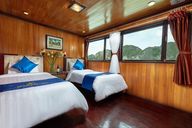 Halong bay Boutique Cruise 2D/1N tour: Kayaking, swimming, Titop island & cave - Boarding around noon