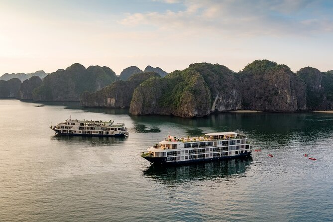 Halong Bay Cruise 2 days 1 night from Hanoi included transfer - Cave sculptures, beach time, and kayaking