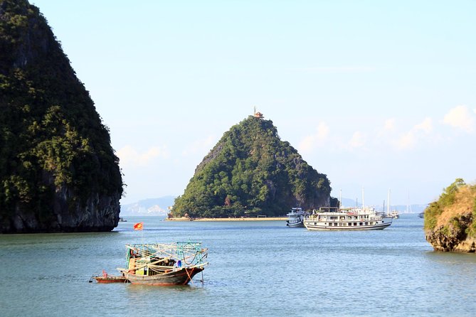 Halong Bay Cruise Day Trip: Titop island, Surprise cave, Swimming, Kayaking - Cruising past Dinh Huong and Ga Choi Islets