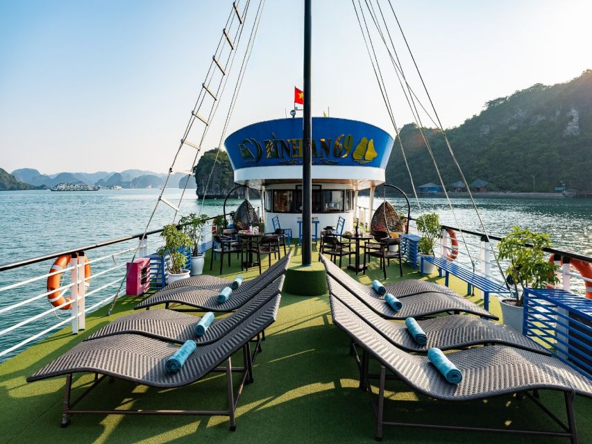 Halong Bay: Day Cruise with Caves, Kayaking & Sunset Party - Titop Island for swimming or a steep viewpoint