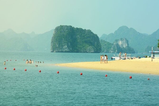 Halong Bay Day Tour 6Hour Deluxe Cruise Limousine Bus Small Group - Titop Island’s beach and hilltop view