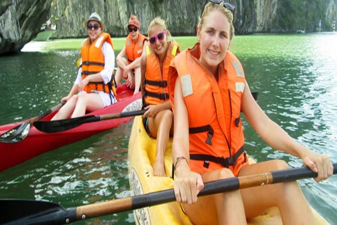 Halong Bay Day Tour: Visit Cave Island Kayaking Swimming Lunch - Boarding the boat and lunch among the limestone islands