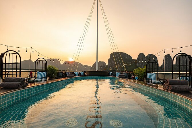 Halong Bay Day Tour With Sunlight Luxury Cruise With Transfer - Sunset snacks, tea, and the ride back
