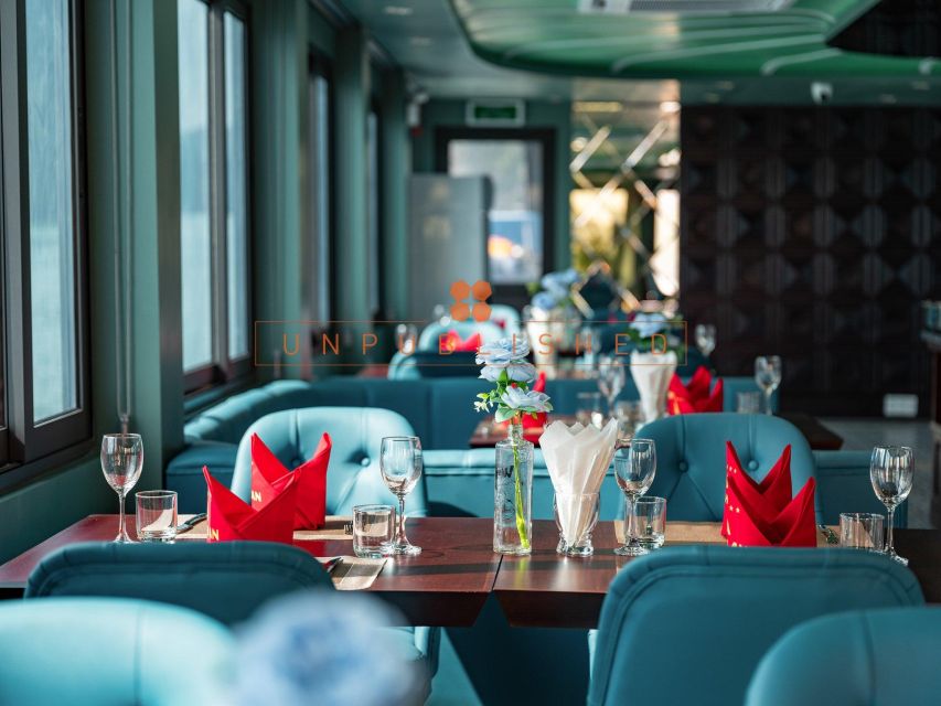 Halong Bay Delights: Deluxe Day Cruise with Kayaking & Lunch - Boarding at Tuan Chau and settling into the cruise
