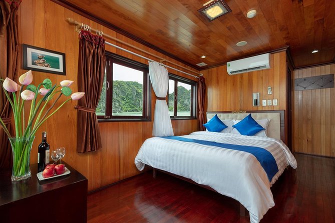 Halong bay deluxe cruise 2 days/ 1 nights: full meals, Kayaking & Swimming - Morning from Hanoi to Halong Harbor
